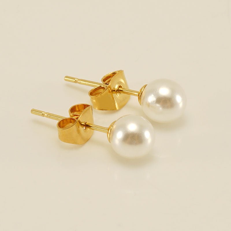 S925 sterling silver freshwater pearl ear studs featuring elegant needle design, perfect for delicate, sophisticated jewelry.