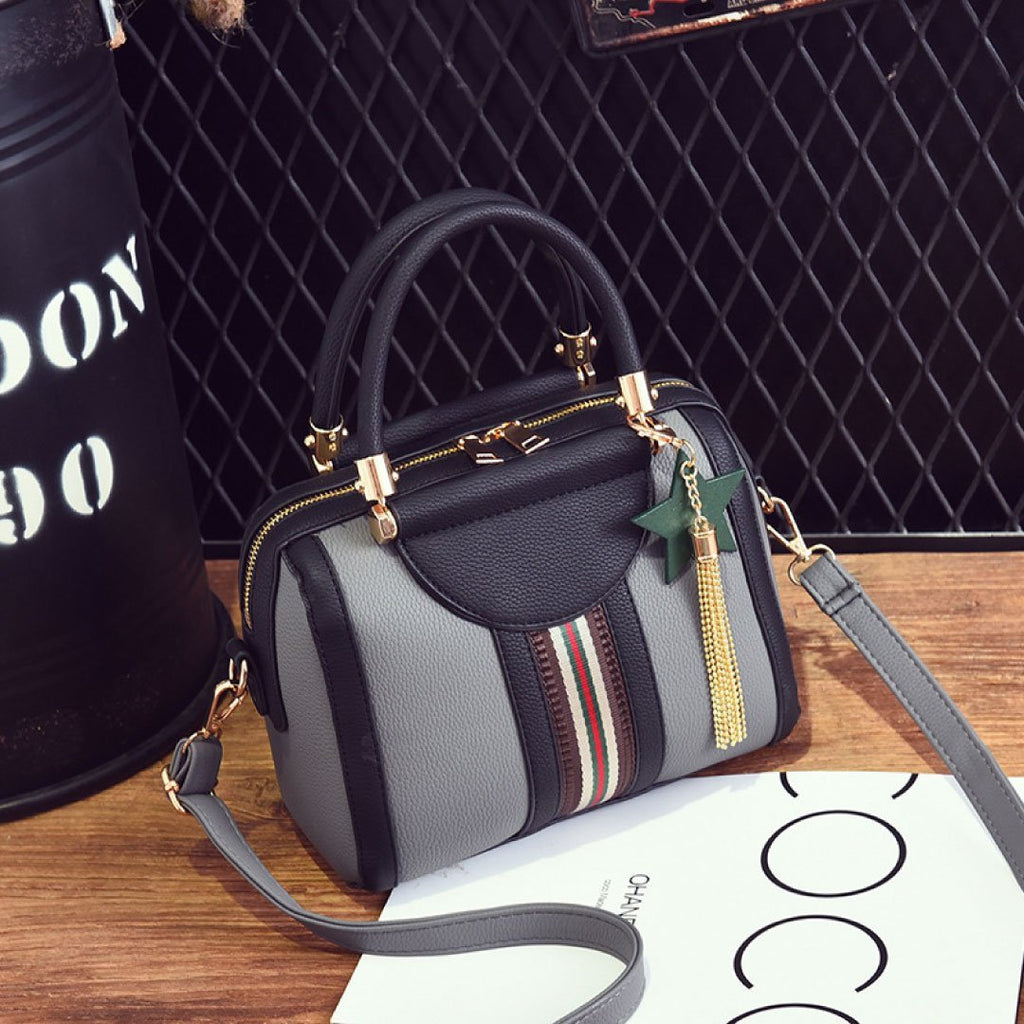 LadyShow.Store Sally Shoulder Bag in black with adjustable strap and top zipper closure, stylish everyday bag.