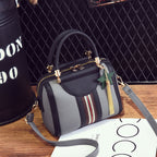 LadyShow.Store Sally Shoulder Bag in black with adjustable strap and top zipper closure, stylish everyday bag.