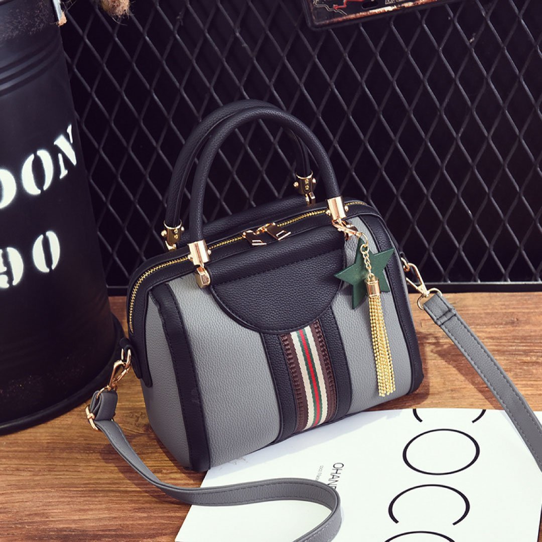 LadyShow.Store Sally Shoulder Bag in black with adjustable strap and top zipper closure, stylish everyday bag.