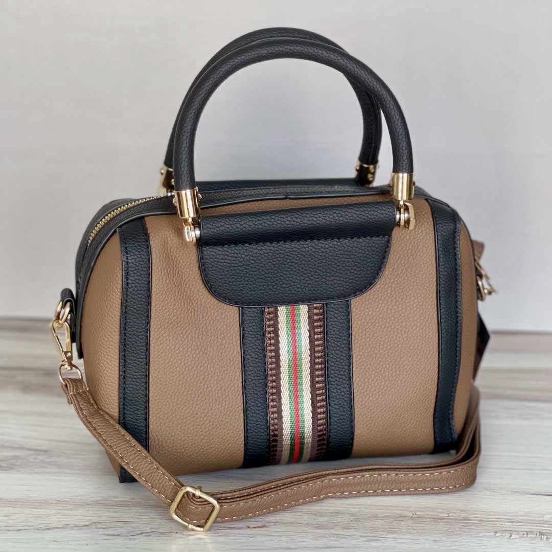 LadyShow.Store Sally Shoulder Bag featuring a stylish, compact design with a top handle and adjustable shoulder strap.