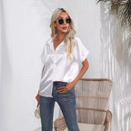 Light beige short sleeve satin button shirt by Bella Mia, casual loose fit top for women, smooth satin fabric, stylish and comfortable.