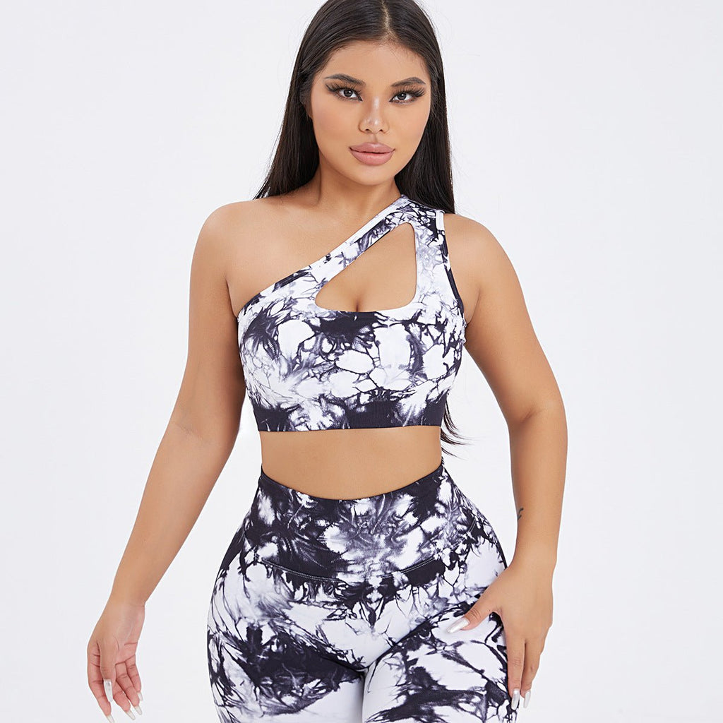 Seamless one-shoulder bra and scrunch high-waisted leggings set by FitiqueFit, perfect for activewear and yoga workouts.