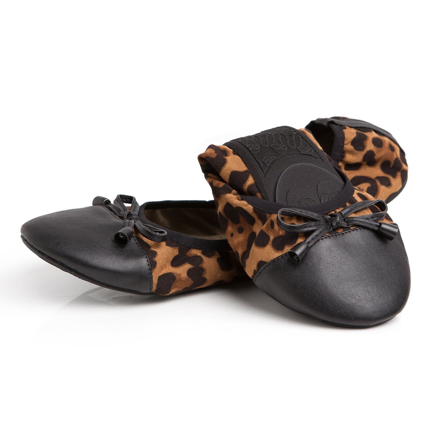 Premium leopard flats from New Arrivals with stylish design and pointed toes, perfect for casual or dressy occasions.