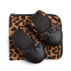 Premium leopard flats by New Arrivals featuring stylish animal print and comfortable slip-on footwear for women.