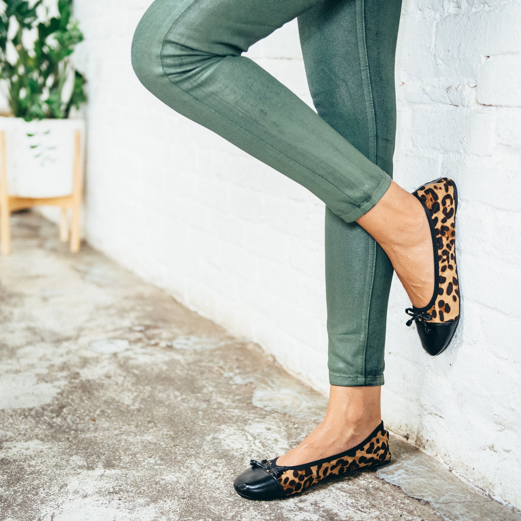 Premium Leopard Flats by New Arrivals, stylish footwear with leopard print, comfortable slip-on shoes, perfect for casual wear.