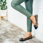 Premium Leopard Flats by New Arrivals, stylish footwear with leopard print, comfortable slip-on shoes, perfect for casual wear.