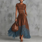 Casualwear set featuring a short-sleeve top and lace-panel midi skirt by FitiqueFit, styled together for a chic, relaxed look.
