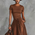 Casualwear set featuring a short-sleeve top and lace-panel midi skirt by FitiqueFit, displayed on a neutral background.