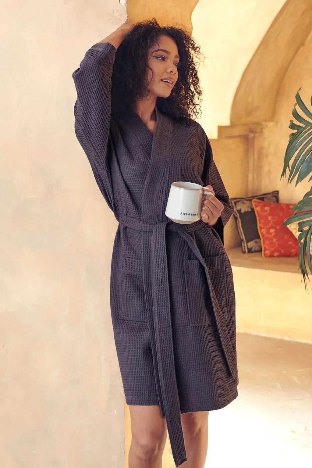Knee-length waffle robe for women by Lotus Linen, featuring soft, textured fabric and a comfortable fit.
