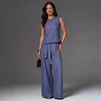 FitiqueFit sleeveless cotton-linen wide-leg pants set in four colors, casualwear for sizes S to 2XL, shown in a stylish outfit.