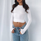 Slim fit women's long sleeve casual crop top by FitiqueFit, shown in a stylish, form-fitting design for everyday wear.