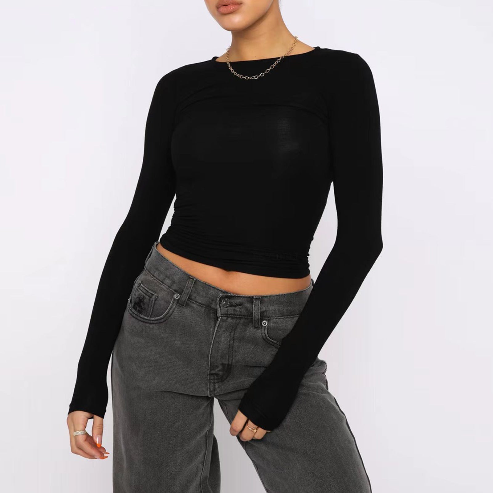 Slim fit long sleeve women's casual crop top by FitiqueFit, featuring a fitted silhouette and stylish design.