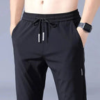 Slim Fit Stretch Jogger Pants with Elastic Waist by FitiqueFit, casualwear, showing the slim fit and comfortable elastic waistband.