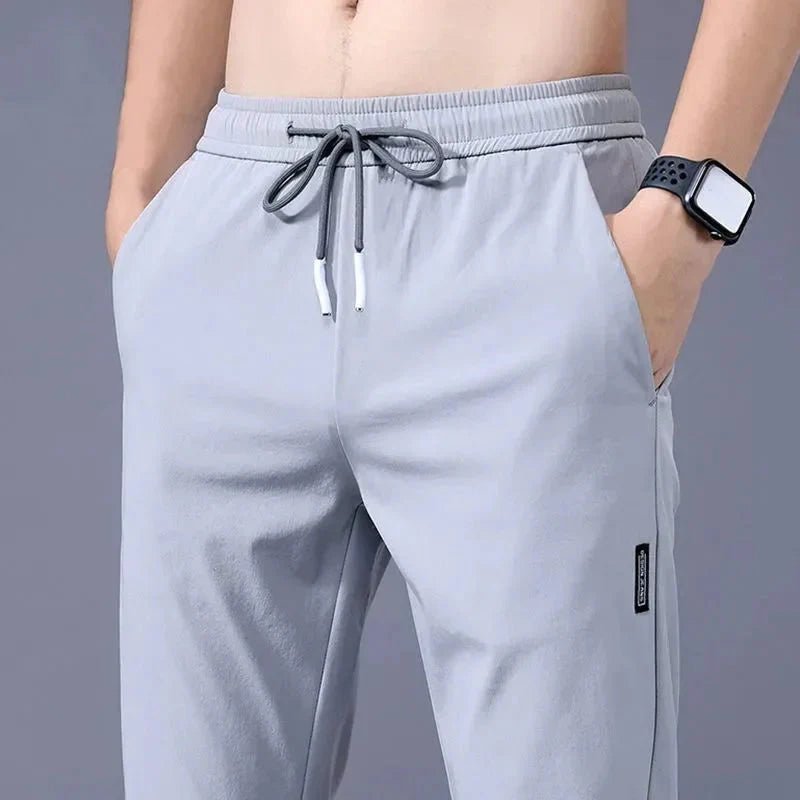 Slim fit stretch jogger pants with elastic waist from FitiqueFit, casualwear with tapered design and comfortable fit.