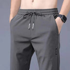Slim fit stretch jogger pants with elastic waist from FitiqueFit, casualwear pants featuring a sleek, tailored look.
