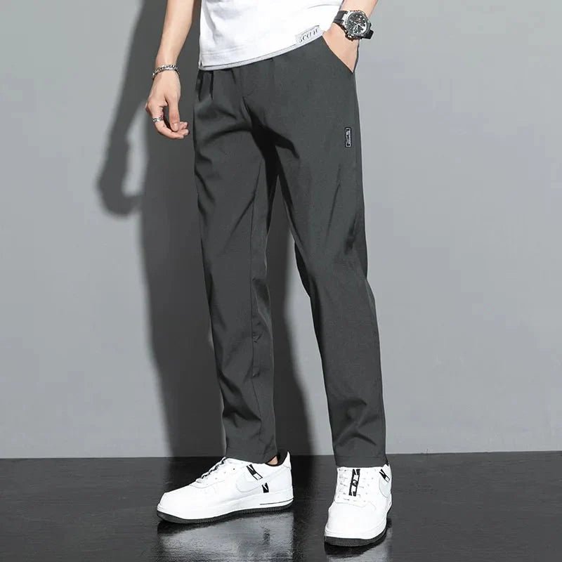 Slim fit stretch jogger pants with elastic waist from FitiqueFit, casualwear featuring a sleek design and comfortable fit.