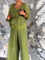 Solid-color chiffon two-piece casualwear set by FitiqueFit, available in 10 colors, includes top and pants in sizes S to 5XL.