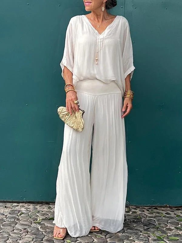 Solid-color chiffon two-piece casualwear set by FitiqueFit in various colors, available in sizes S to 5XL, shown on a model.
