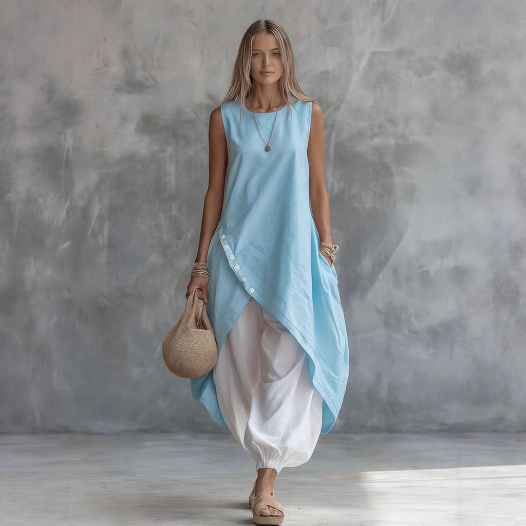 Solid-color sleeveless loose-fit casual dress with patch pockets by FitiqueFit, perfect for comfortable everyday wear.