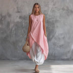 Light blue sleeveless loose-fit casual dress with patch pockets from FitiqueFit, perfect for relaxed, everyday wear.