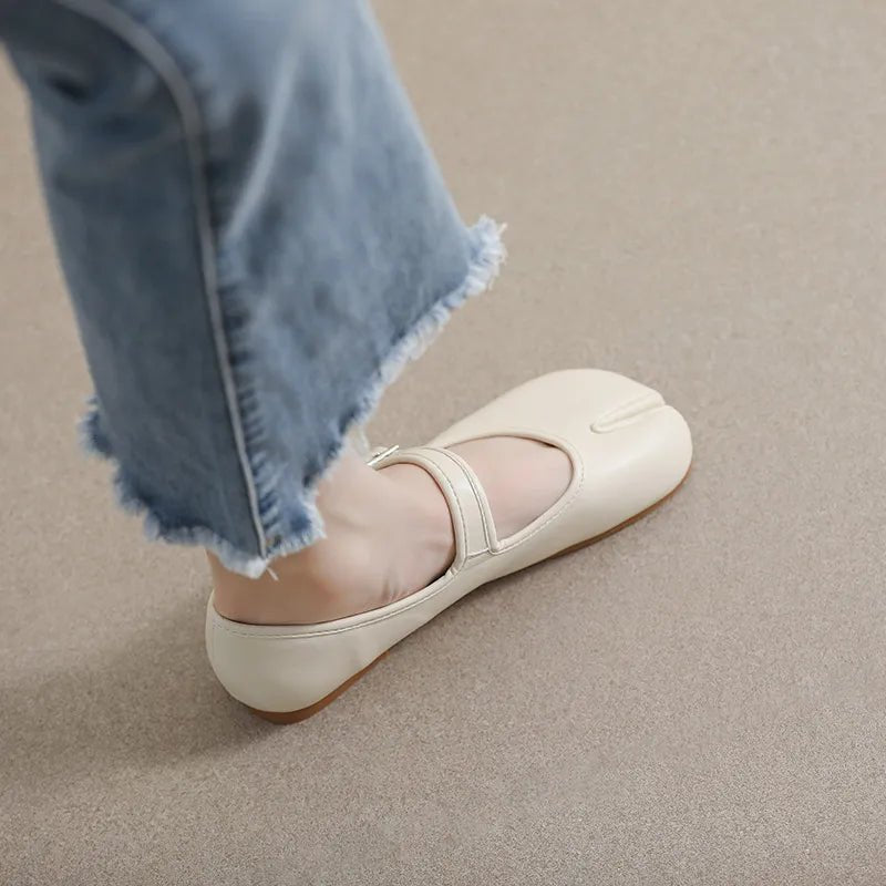 Women's split-toe PU leather flat slip-on shoes from Plush Fashion Hub, featuring a sleek design and comfortable flat sole.