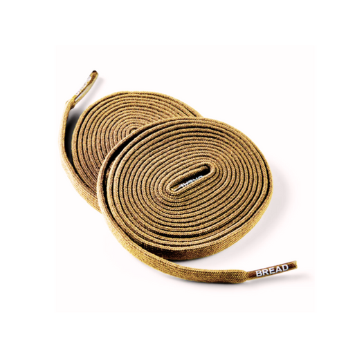 Stack of Bread Coyote Brown elastic shoelaces showing their flexible, durable design and color.