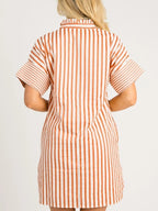 Stripe pinched V-neck mini dress by Trendsi featuring turn-up cuffs and pockets, shown on a model.