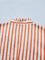 Stripe pinched V-neck mini dress with turn-up cuffs and pockets, trendy and stylish dress by Trendsi.