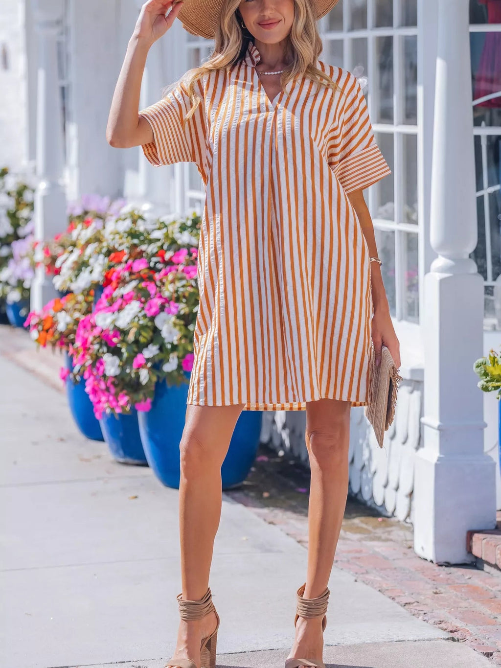 Stripe pinched V-neck mini dress with turn-up cuffs and pockets, stylish and casual for trendy fashion looks.