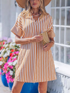 Stripe pinched V-neck mini dress with turn-up cuffs and pockets, stylish women's dress by Trendsi, perfect for casual or dressy occasions.