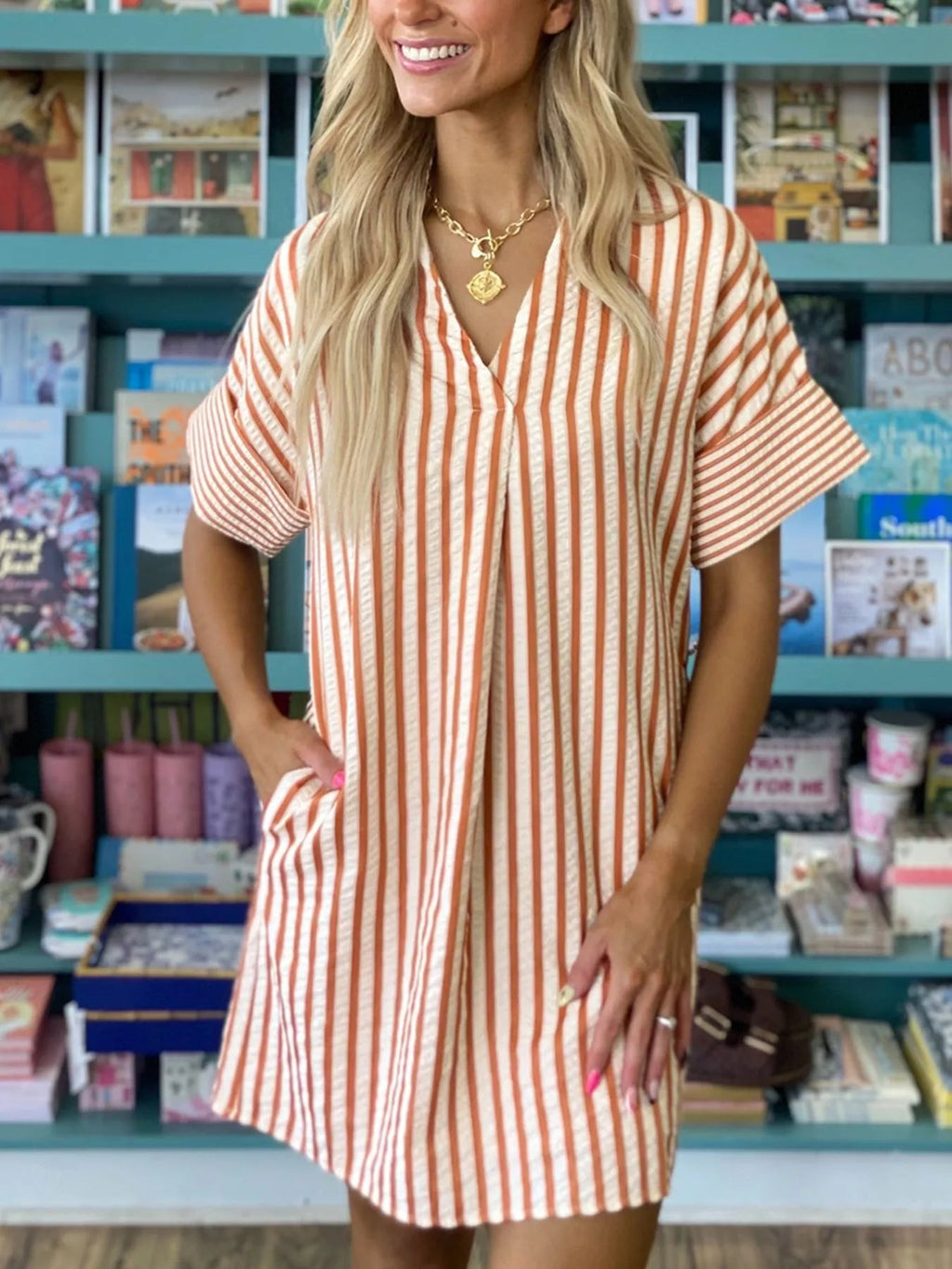 Stripe pinched V-neck mini dress with turn-up cuffs and pockets, stylish and fitted from Trendsi.