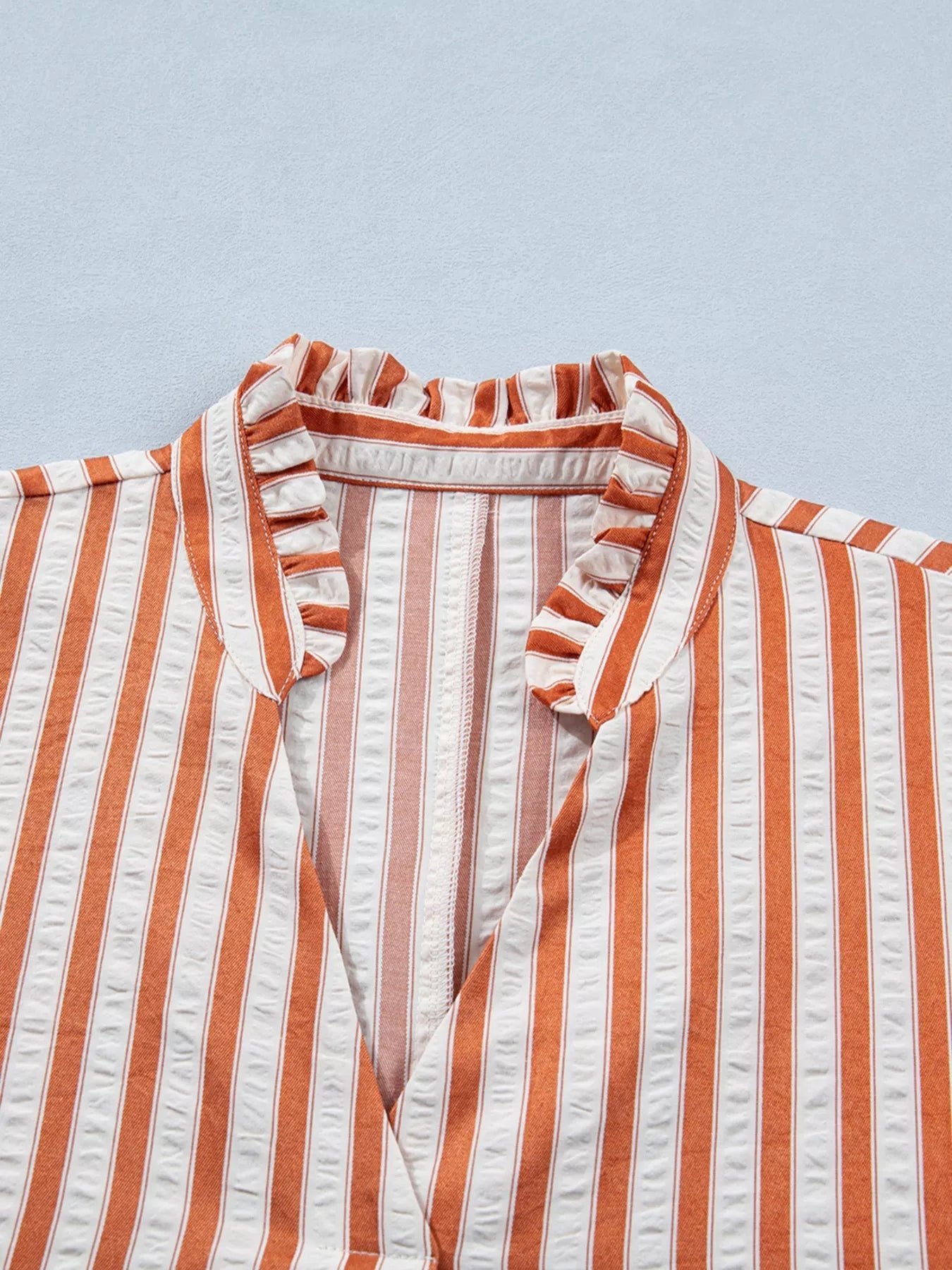 Stripe pinched V-neck mini dress with turn-up cuffs and pockets, stylish and casual trendy dress by Trendsi.