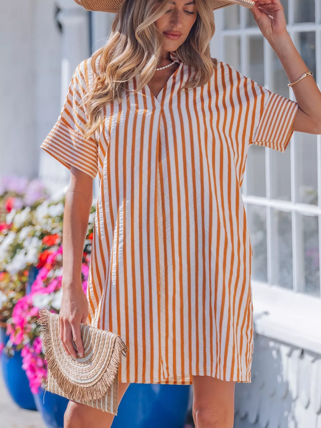 Stripe pinched V-neck mini dress with turn-up cuffs and pockets, stylish and casual by Trendsi.