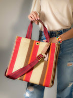 LadyShow.Store stripe tote bag featuring bold horizontal stripes and durable handles for everyday use.