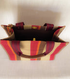 LadyShow.Store striped tote bag with sturdy handles, showcasing a stylish design perfect for everyday use.
