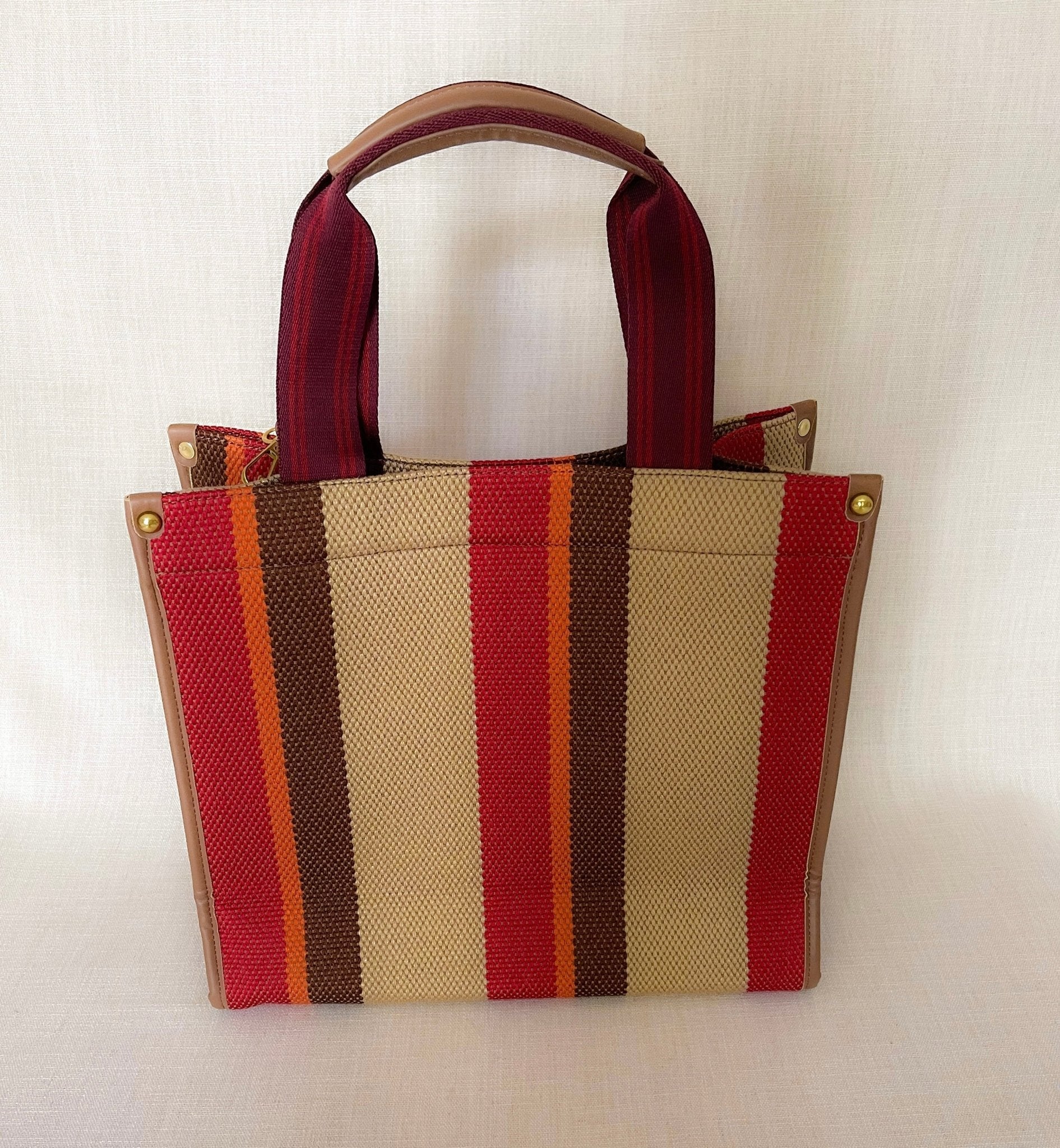 LadyShow.Store stripe tote bag with bold stripe pattern, featuring sturdy handles and spacious interior for everyday use.