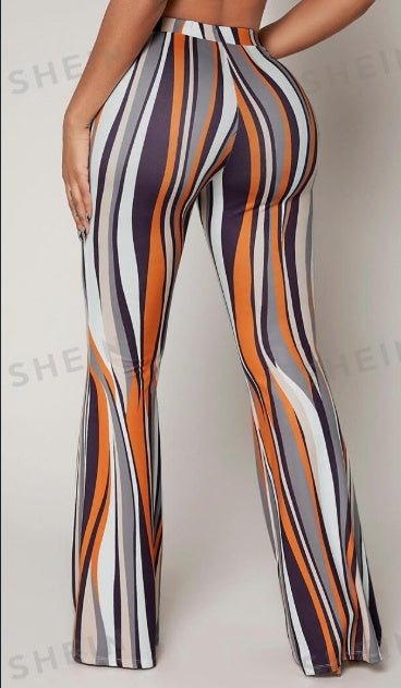 Striped high-waist flared leg pants in black and white, stylish and comfortable for casual or evening wear.