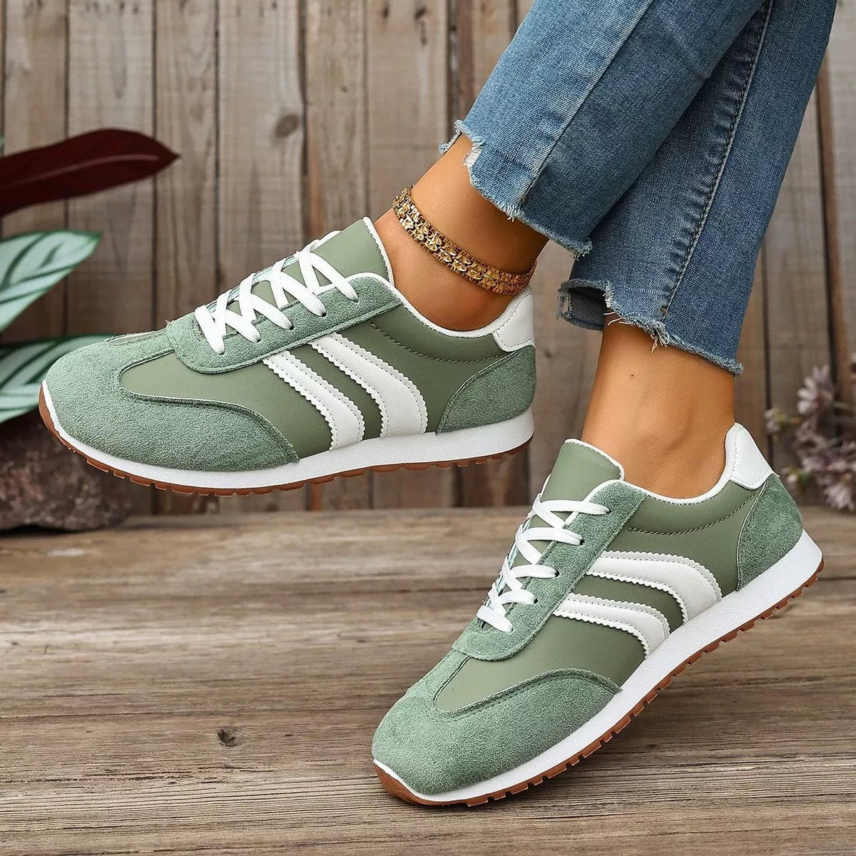 Women's casual striped suede lace-up sneakers by Trendsi, featuring comfortable fashion footwear with stylish design and breathable material.