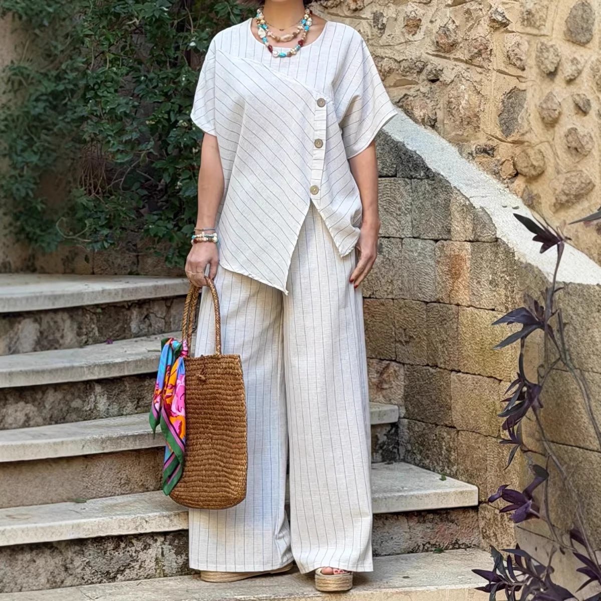Casual FitiqueFit striped shirt and loose pants set with three-quarter sleeves, perfect for relaxed everyday wear.