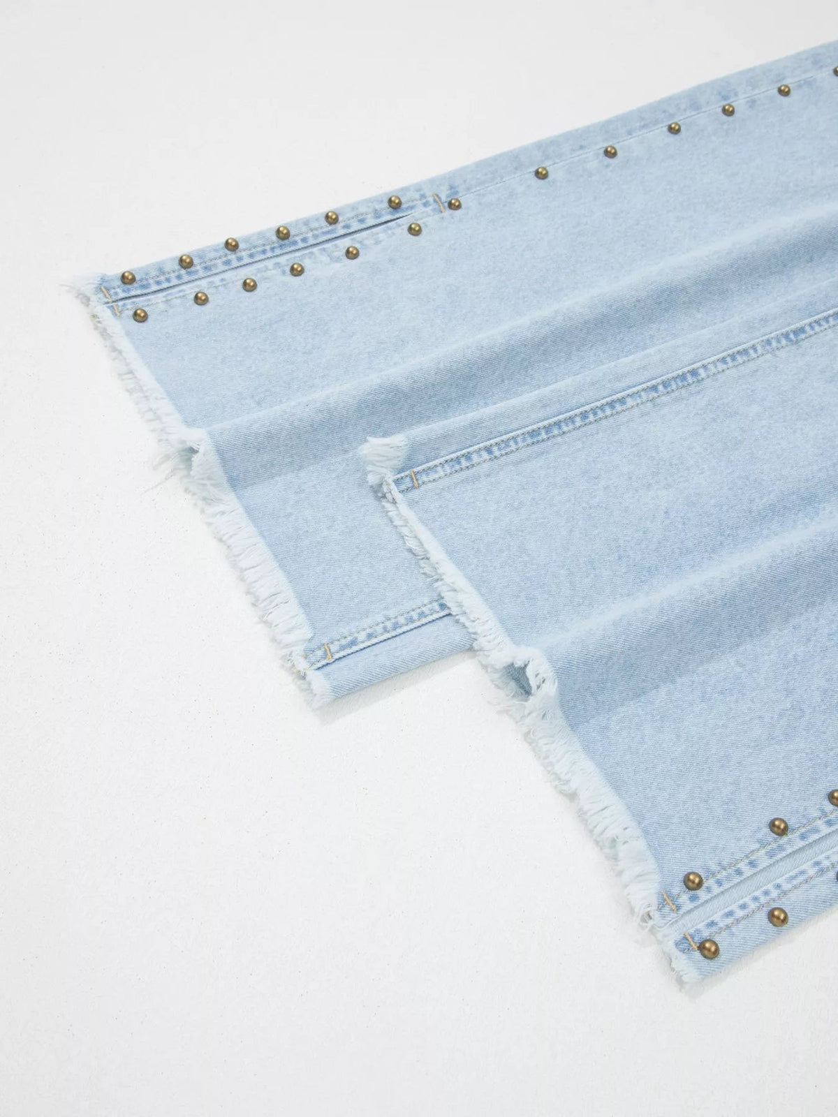 Plush Fashion Hub studded wide-leg jeans with frayed hem and side slits, casual denim pants with decorative metal studs.