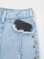 Trendsi studded wide-leg jeans with frayed hem and side slits, showcasing a trendy denim style with added embellishments.