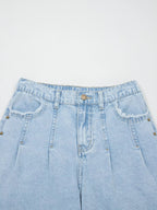 Trendsi studded wide leg jeans with frayed hem and side slits, showcasing distressed denim and fashionable design details.