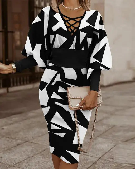 Elegant women's V-neck long sleeve pencil dress by Trendy Attic Store01, shown in a sleek, fitted silhouette on a model.