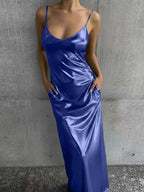 Textured mirror-finish U-neck slip maxi dress with pockets, casualwear by FitiqueFit, shown on a model in a relaxed setting.