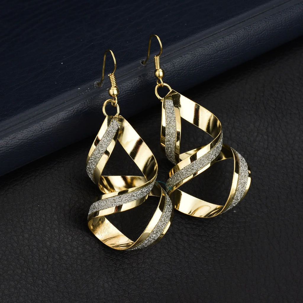 Fashion trendy earrings and ear studs from Trendy Attic Store01, featuring stylish designs with gold and silver finishes.
