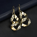 Fashion trendy earrings and ear studs from Trendy Attic Store01, featuring stylish designs with gold and silver finishes.