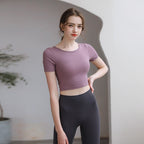 FitiqueFit activewear yoga top with chest pad, breathable fabric, and stylish back design for a tight fit during workout sessions.