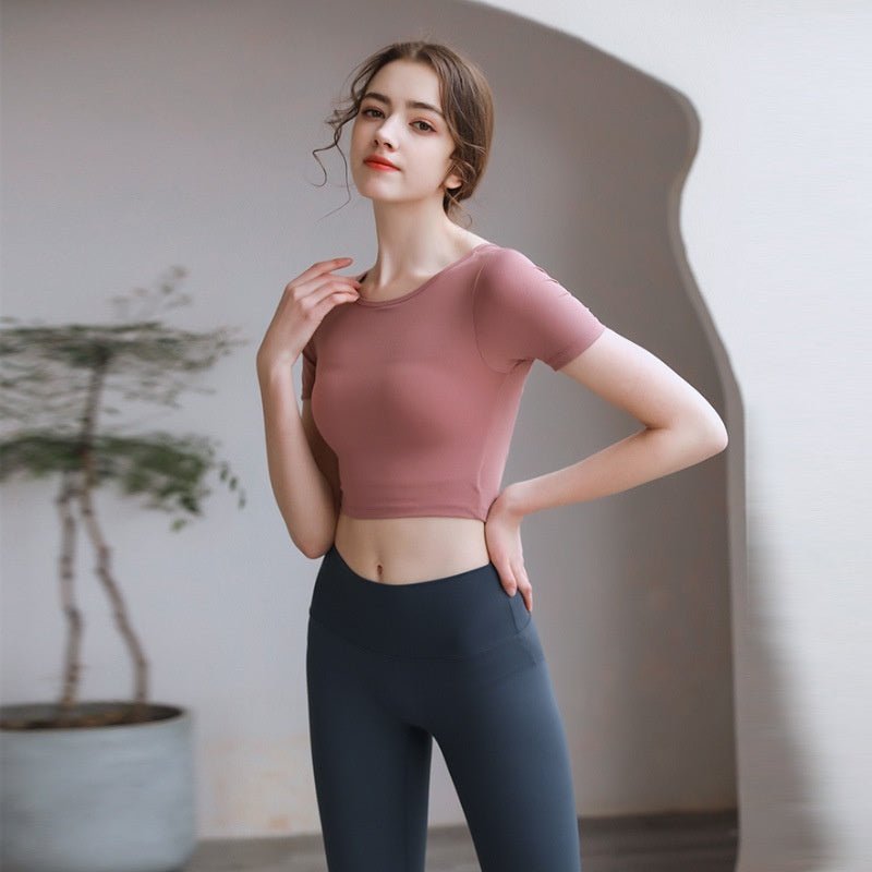 FitiqueFit activewear yoga top with chest pad, breathable fabric, and stylish back design for comfortable movement.