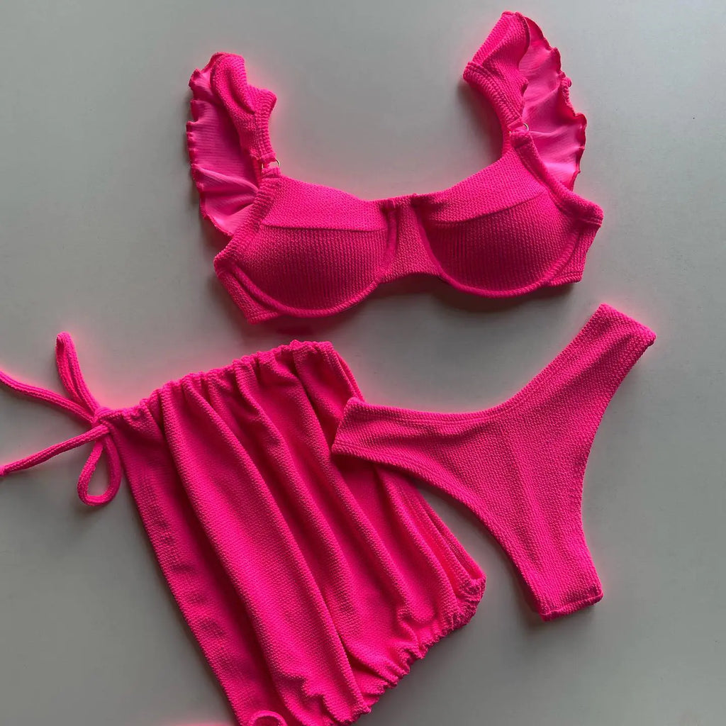 Women's solid color three-piece bikini set from Trendy Attic Store01, featuring a bikini top, bottom, and cover-up in vibrant fabric.